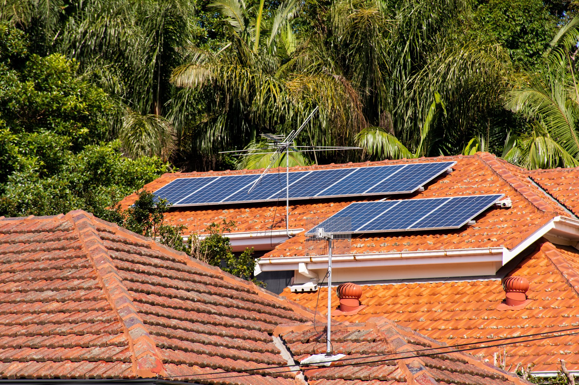solar-panels-on-orange-roof-tiles-of-the-residenti-2023-11-27-04-51-22-utc